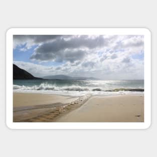 Beautiful view on the ocean and rocks from sandy beach in Ireland Sticker